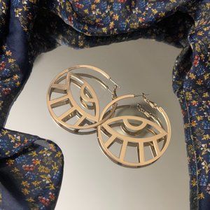 Sunburst eye earrings